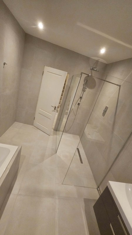 Bathroom and walk-in shower by Complete Construction NE Limited