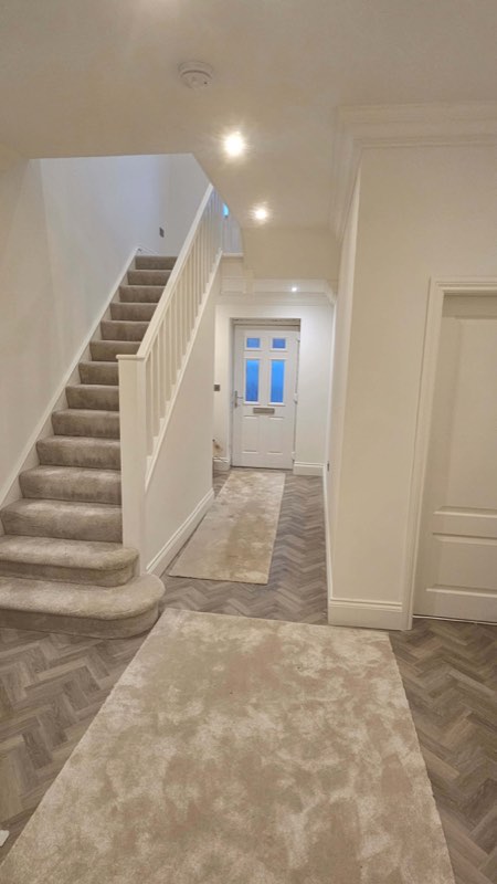 Hallway and staircase by Complete Construction NE Limited