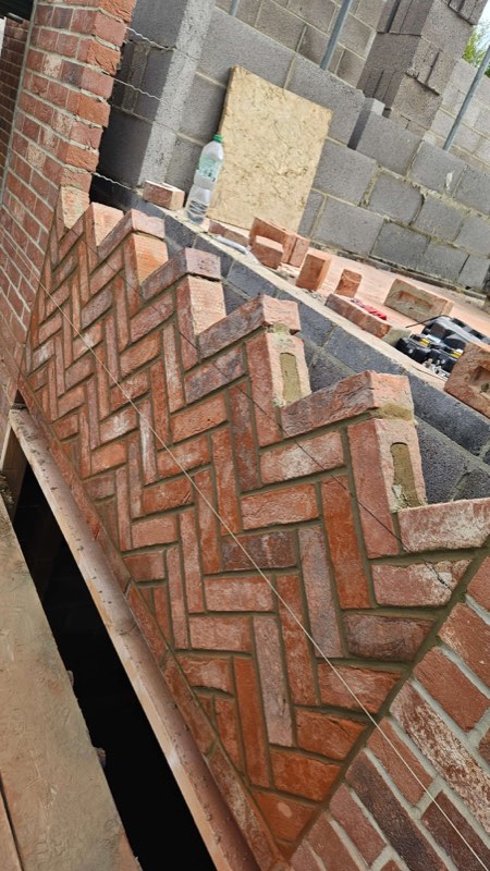 Herringbone brick detail by Complete Construction NE Limited