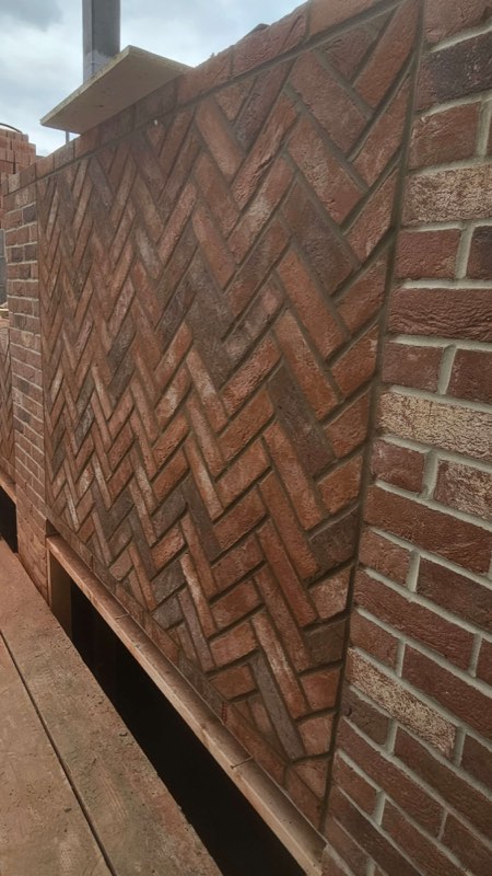 Herringbone brick feature by Complete Construction NE Limited
